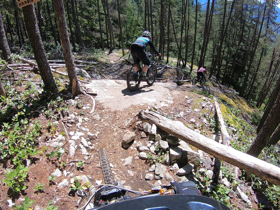 Riding downhill on a mountain bike is safer with a SwitchGrade Saddle Tilt Device